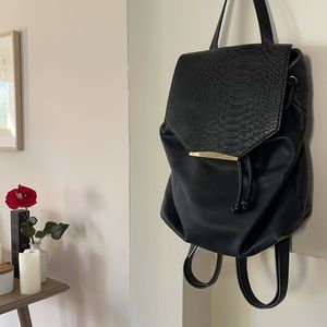 croc textured faux leather backpack